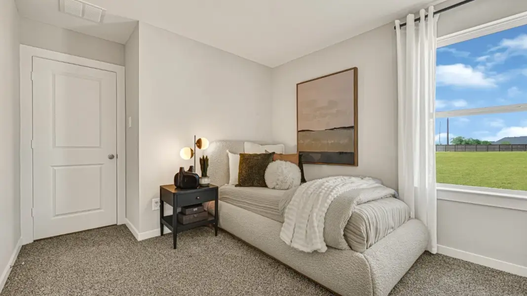 Furnished interior in a model home at Wildbloom in Beasley (Image 16).