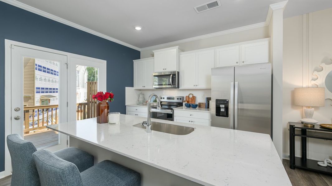 Furnished interior in a model home at Townes at Asbury in Atlanta (Image 5).