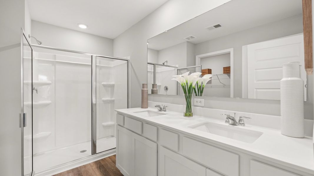 Furnished interior in a model home at Oakchase at Hampton in Hampton (Image 20).