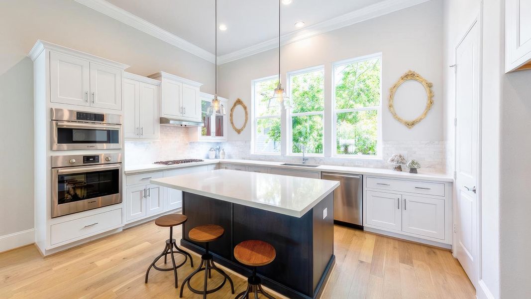 Furnished interior in a model home at Upper East River in Houston (Image 7).