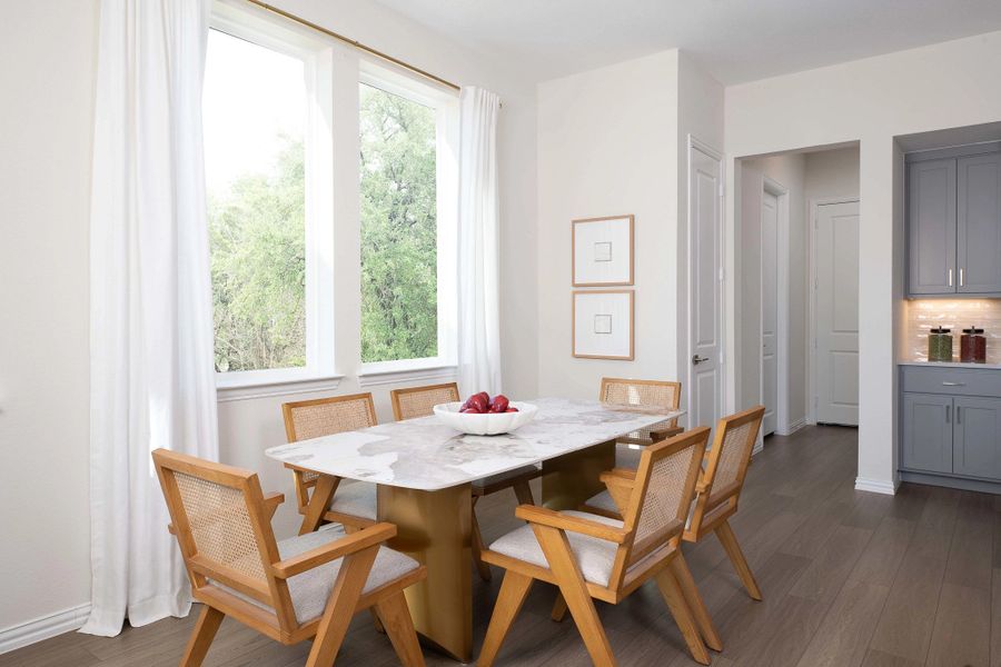 Furnished interior in a model home at The Farm in Allen (Image 5).