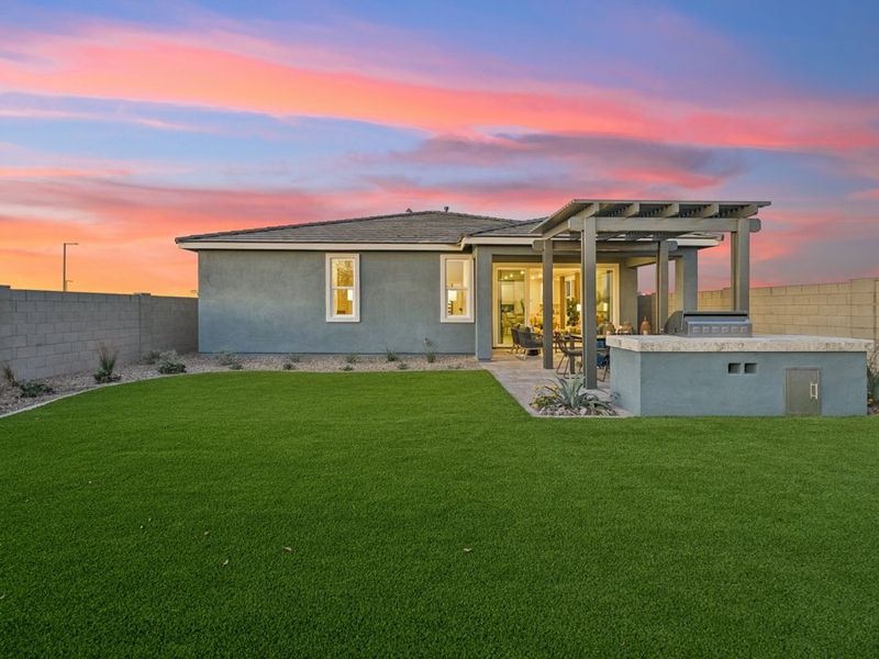 A house with a grass yard. A house with a grass yard.
