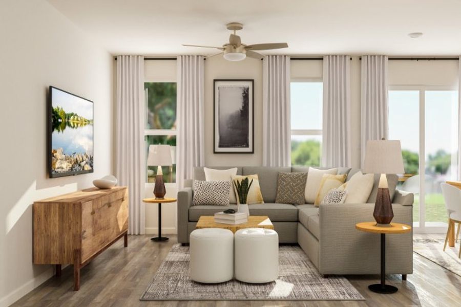 A living room with a couch and a table. A living room with a couch and a table.