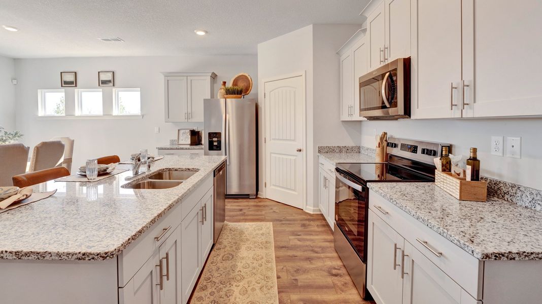 Furnished interior in a model home at The Orchard in Millington (Image 15).