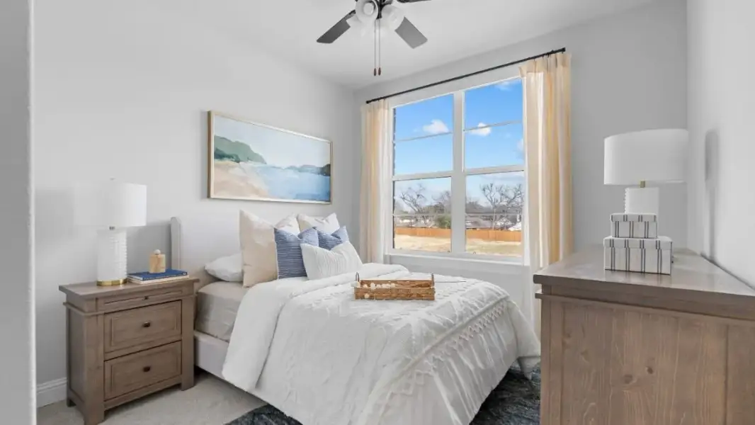 Furnished interior in a model home at White Rock Trail Addition in Dallas (Image 19).
