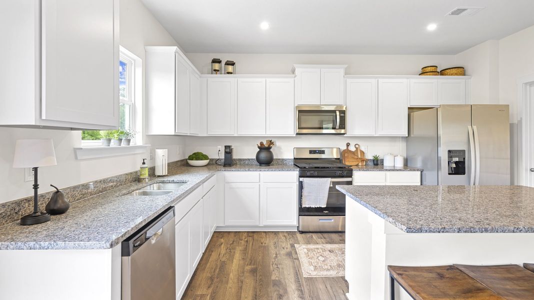 Furnished interior in a model home at The Cove at Thrasher Landing in Hixson (Image 10).