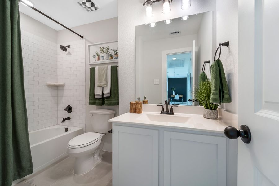 Furnished interior in a model home at Magnolia Springs in Montgomery (Image 40).