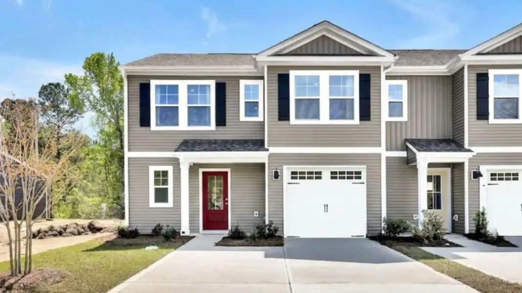 Front exterior of a home in the The Cove at Indigo Preserve Townhomes community, located in Leland, NC (Image 4).