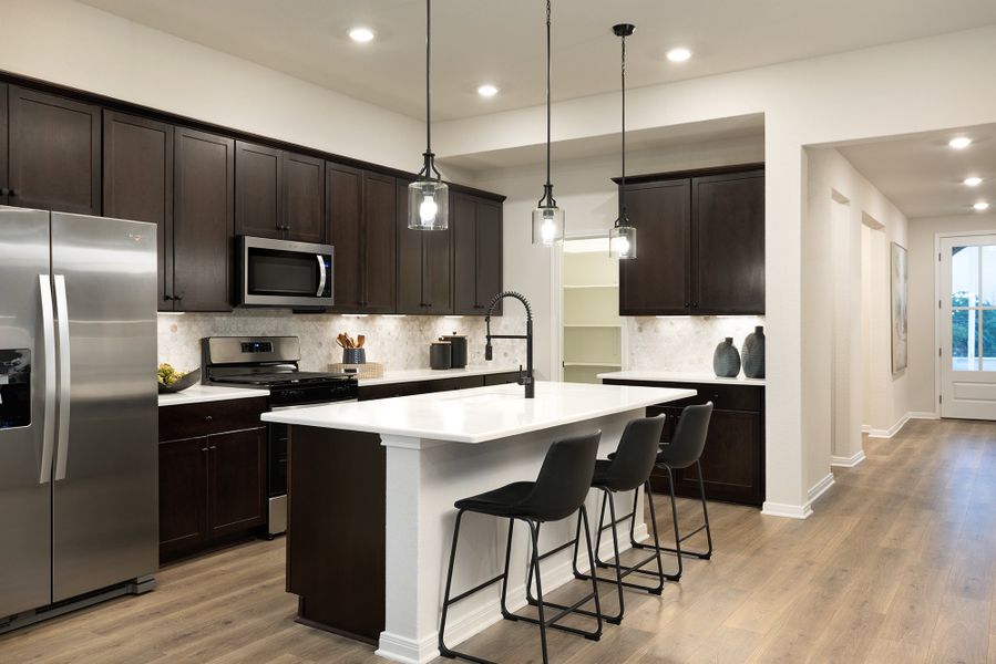 Furnished interior in a model home at Comanche Ridge in San Antonio (Image 4).