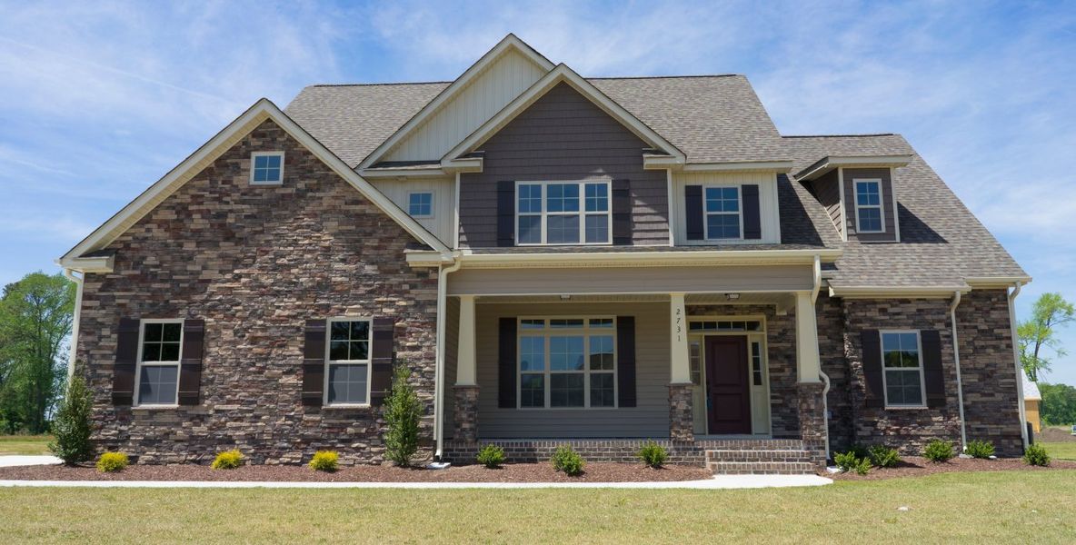 Front exterior of a home in the Cheshire Landing community, located in Grimesland, NC (Image 10).