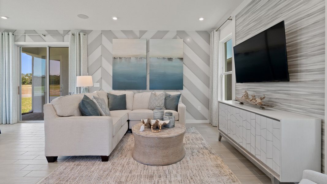 Trinity Place Staged Model Ambersweet Living Area by DRB Homes in Saint Cloud FL Trinity Place Staged Model Ambersweet Living Area by DRB Homes in Saint Cloud FL