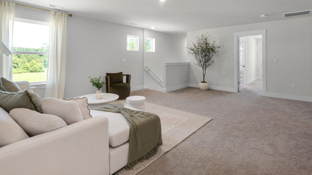 Furnished interior in a model home at Surfside Landing in Hubert (Image 21).