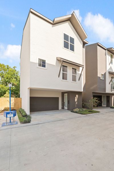 Front exterior of a home in the Rachel Reserve community, located in Houston, TX (Image 3).