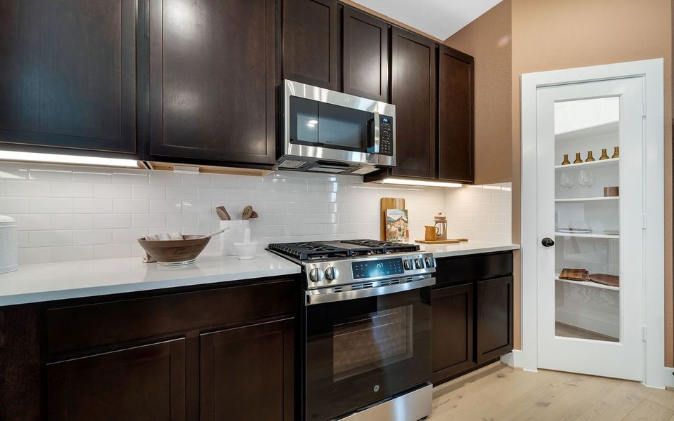 Furnished interior in a model home at Harvest Pointe in Needville (Image 17).