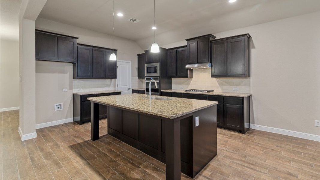Furnished interior in a model home at Eden Ranch in Arlington (Image 23).