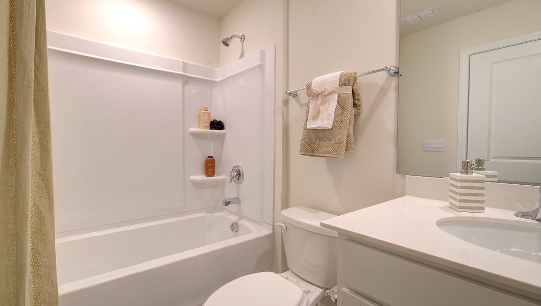 Furnished interior in a model home at Wildbrook Village Townhomes in Waynesville (Image 7).