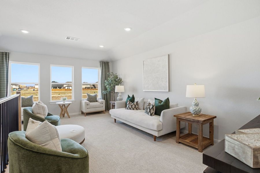 Furnished interior in a model home at Lily Creek at Sutton Fields in Aubrey (Image 39).