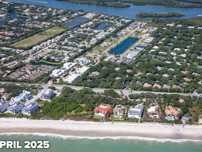 Aerial view of the The Strand community in Vero Beach, FL, showing layout and nearby surroundings (Image 10).