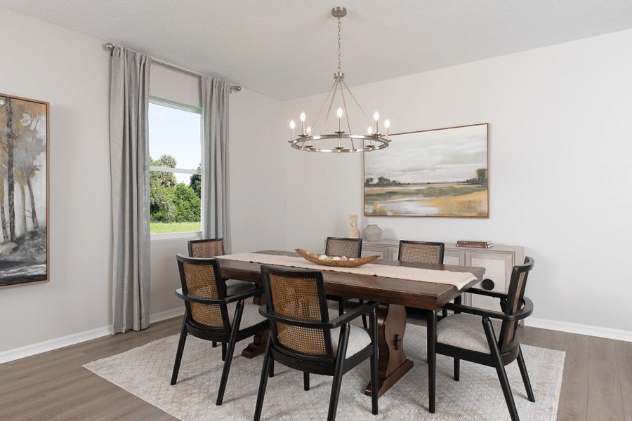 Furnished interior in a model home at Oakfield Trails Traditional in Parrish (Image 3).