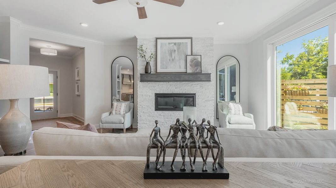 Furnished interior in a model home at The Courtyards at Redbud Lane in Holly Springs (Image 20).