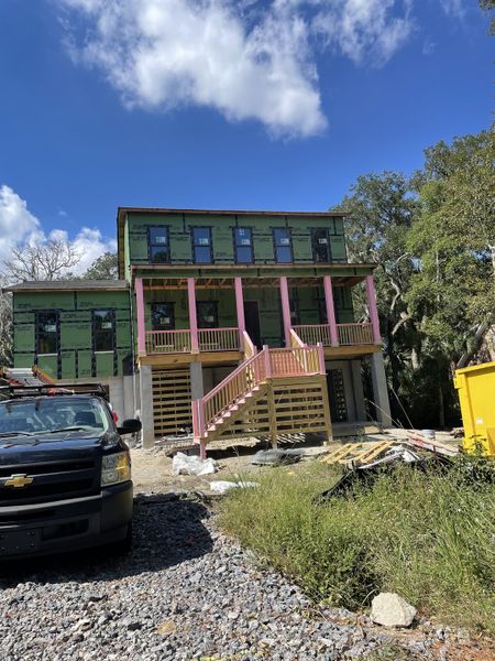 A construction site with a two-story home in Enclave at Palmetto Fort by Homes by Dickerson (Mount Pleasant, SC). A construction site with a two-story home in Enclave at Palmetto Fort by Homes by Dickerson (Mount Pleasant, SC).