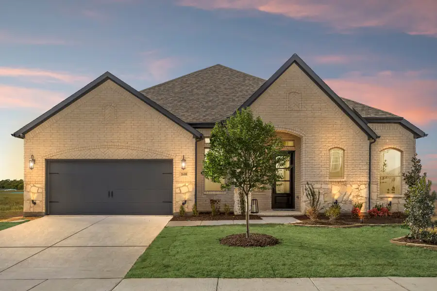 Front exterior of a home in the Anna Town Square community, located in Anna, TX (Image 4).