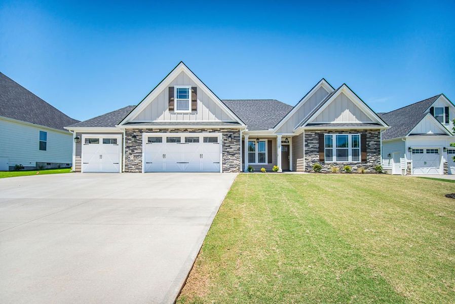 Front exterior of a home in the Lakeside at Blue Ridge Plantation community, located in Taylors, SC (Image 10).