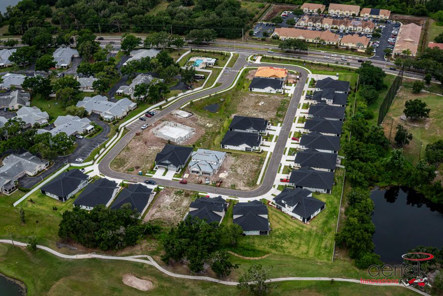 Aerial view of the Fairway Pointe - 55+ Villa Community community in Sun City Center, FL, showing layout and nearby surroundings (Image 9).