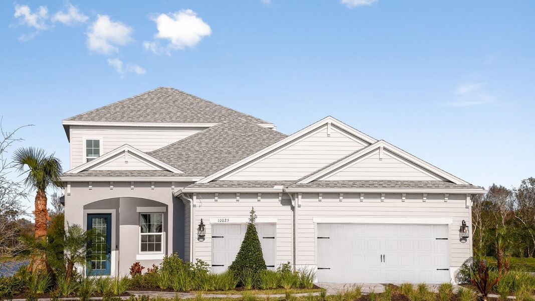 Front exterior of a home in the Wildleaf at North River Ranch community, located in Parrish, FL (Image 15).
