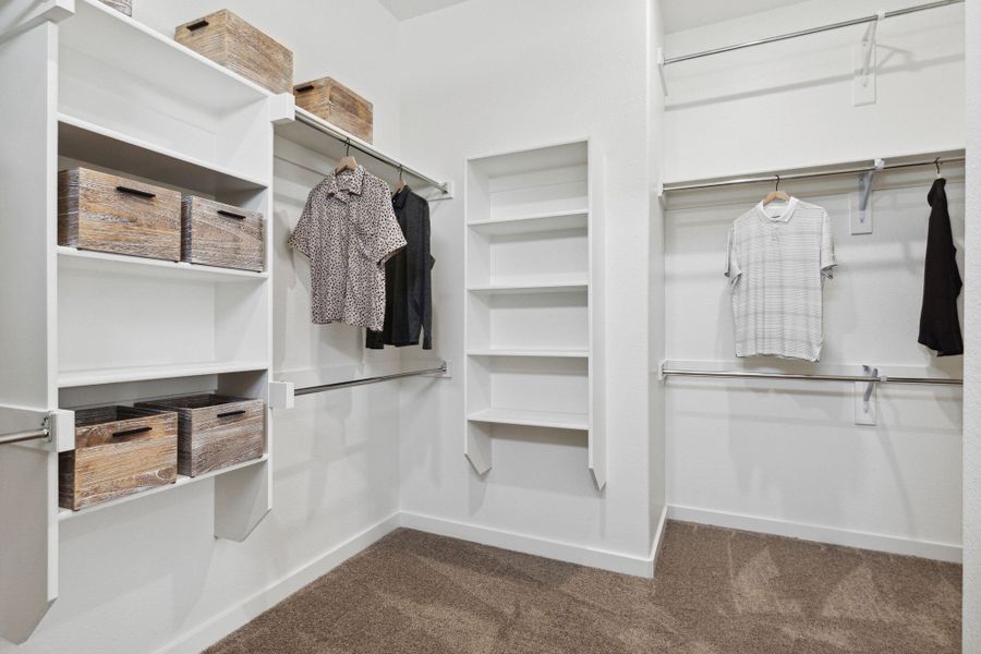 Primary suite closet in a LakePointe new home in Lavon TX by Trophy Signature Homes