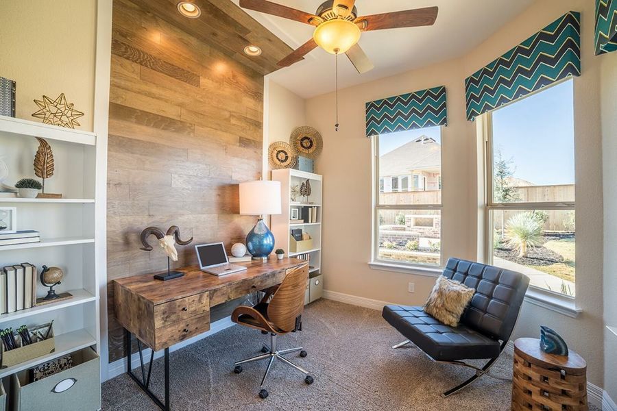 Furnished interior in a model home at Sunfield in Buda (Image 17).