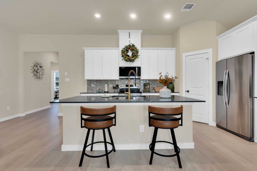 Furnished interior in a model home at Freeman Farm in Kaufman (Image 3).