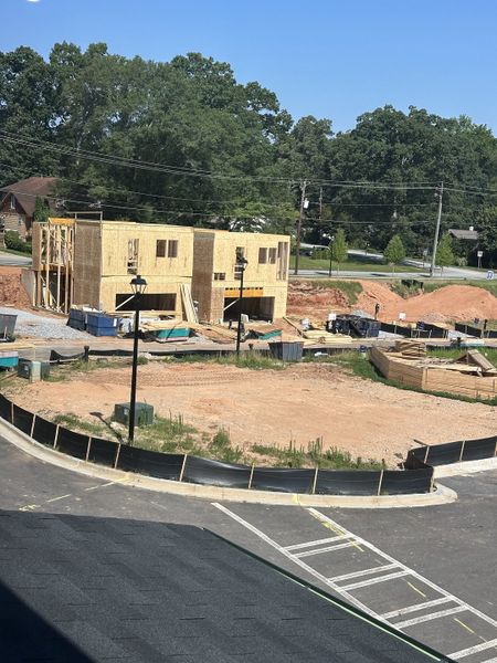 New construction site with framed homes in the Celesta community by David Weekley Homes, Decatur, GA.