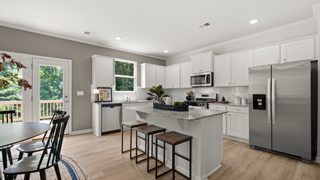 Furnished interior in a model home at Northwoods at Mirror Lake in Villa Rica (Image 12).