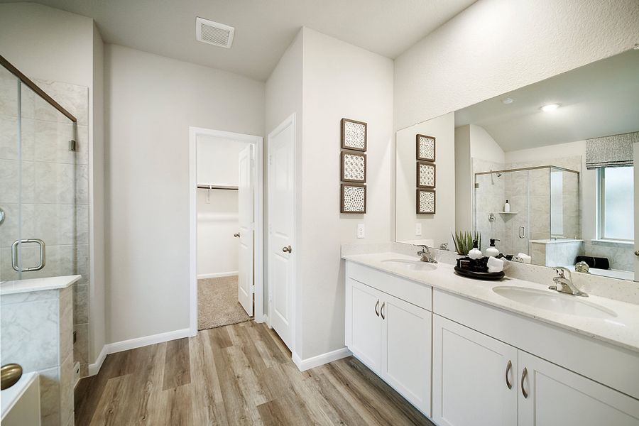 Furnished interior in a model home at Sunterra: Founders in Katy (Image 5).