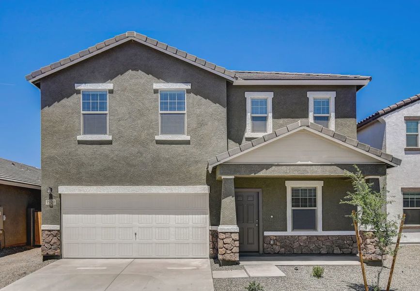 Front exterior of a home in the Stonebridge Manor community, located in Waddell, AZ (Image 10).