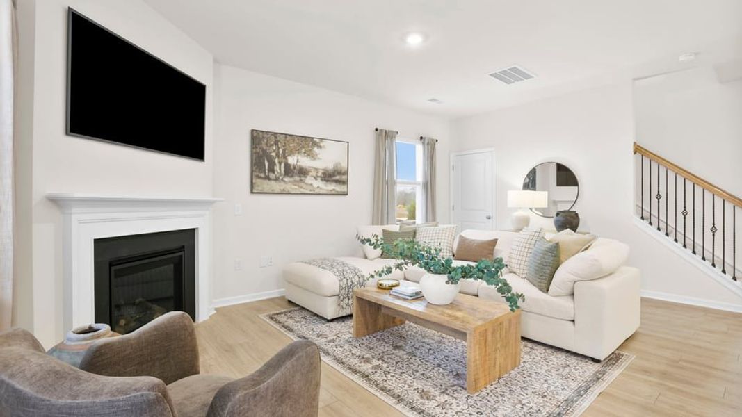 Furnished interior in a model home at Benjamin's Grove in Woodruff (Image 9).