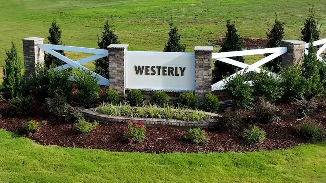 Entrance to the Westerly community in Lillington, NC, featuring signage and landscaping (Image 2). Entrance to the Westerly community in Lillington, NC, featuring signage and landscaping (Image 2).