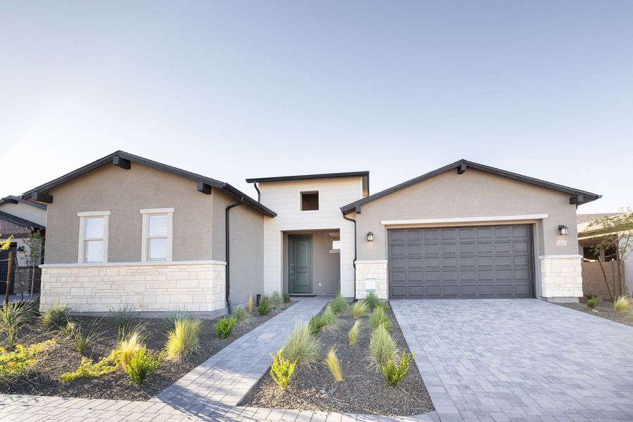 Front exterior of a home in the Overlook at The Dells community, located in Prescott, AZ (Image 1).