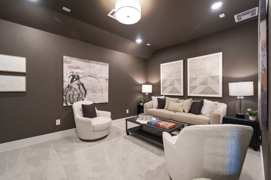 Furnished interior in a model home at Grand Magnolia in Waller (Image 40).