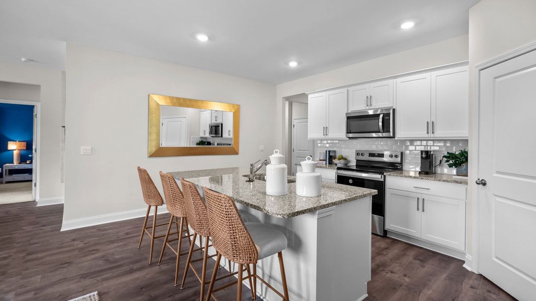 Furnished interior in a model home at Tyler - Home on the Lake in New Bern (Image 22).