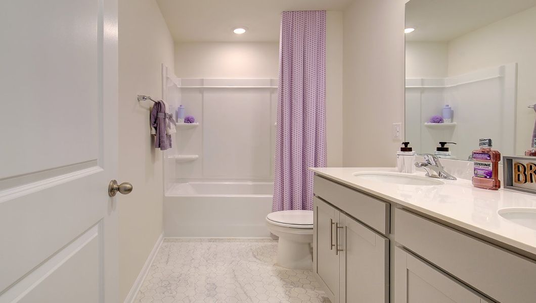 Furnished interior in a model home at Wildbrook Village in Waynesville (Image 8).