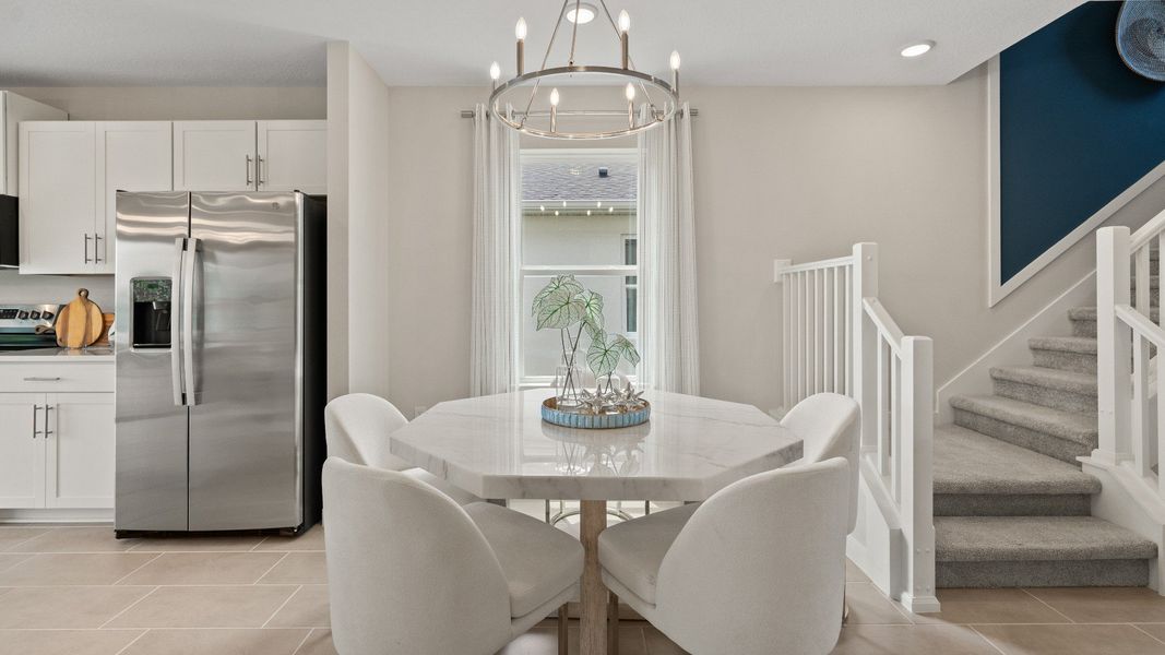 Ponte Vedra Model Dining Area at Willowbrook North by DRB Homes in Winter Haven FL