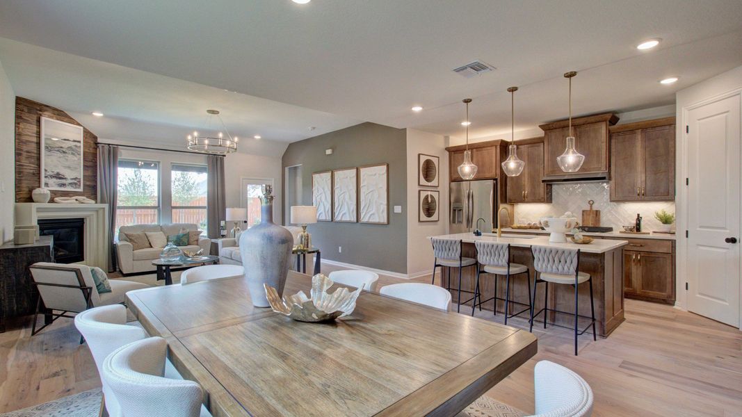 Elegant open layout, warm wood cabinetry, luxurious lighting fixtures. Located in the sought-after Meyer Ranch.