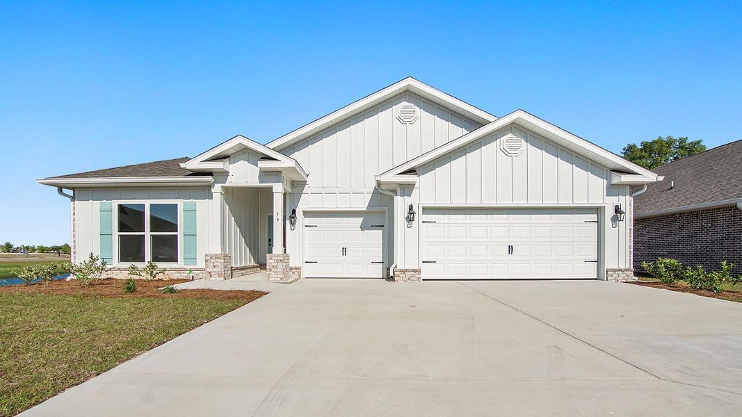 Front exterior of a home in the Holley Grove at Peach Creek - Waterfront Homes community, located in Santa Rosa Beach, FL (Image 1).