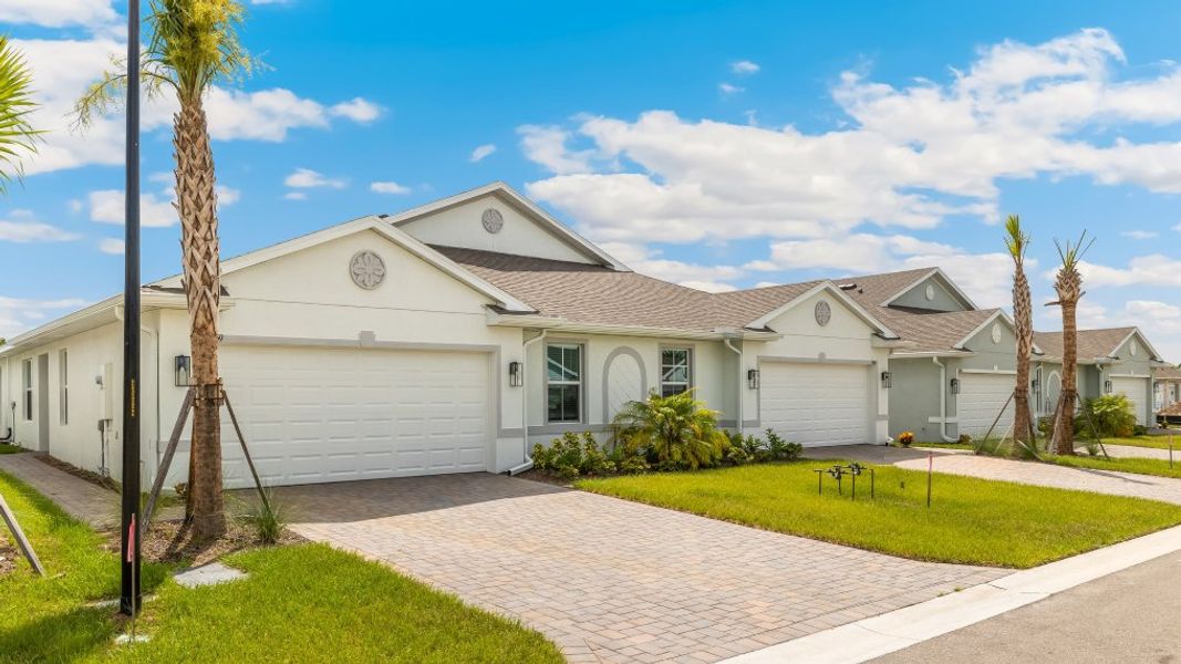 Front exterior of a home in the Sea Cove community, located in Punta Gorda, FL (Image 10).