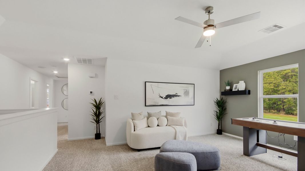 Furnished interior in a model home at East Williams Cove in Conroe (Image 21). Furnished interior in a model home at East Williams Cove in Conroe (Image 21).