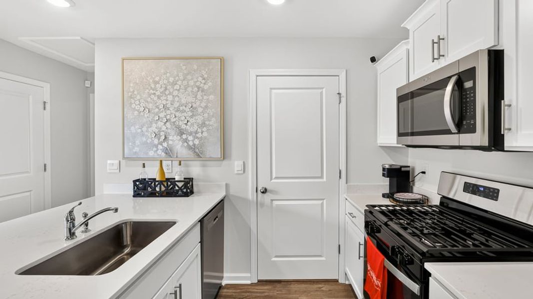 Furnished interior in a model home at Village 3 in Woodruff (Image 15). Furnished interior in a model home at Village 3 in Woodruff (Image 15).