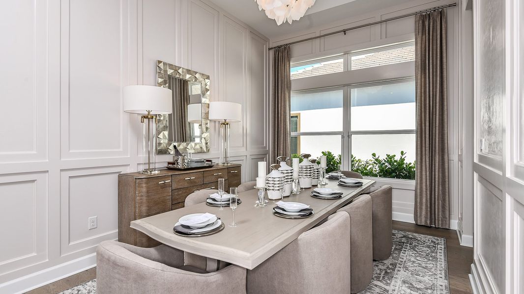 Furnished interior in a model home at Esplanade by the Islands in Naples (Image 58).