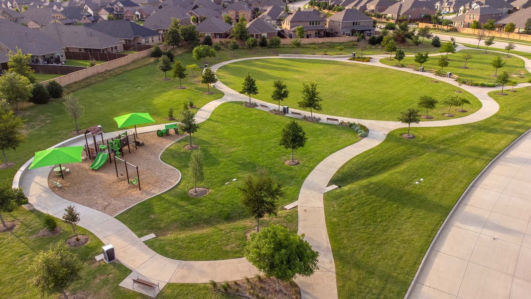 Aerial view of the Trinity Falls community in McKinney, TX, showing layout and nearby surroundings (Image 12).